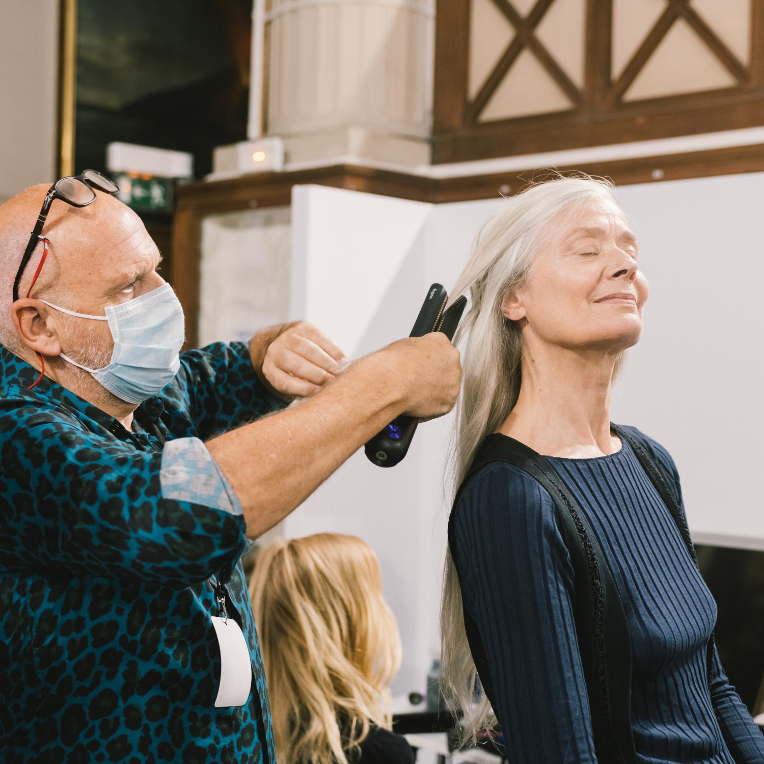 The Dyson Corrale straightener being used at Paris Fashion Week.